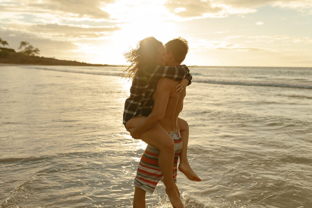 Married couple at Mauna Kea beach in Hawaii