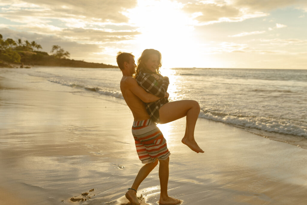 Married couple at Mauna Kea beach in Hawaii