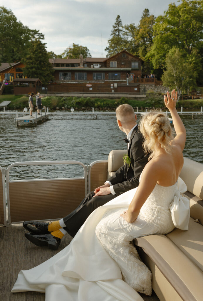 A married couple celebrating their luxurious wedding Ruttger's Lake Resort