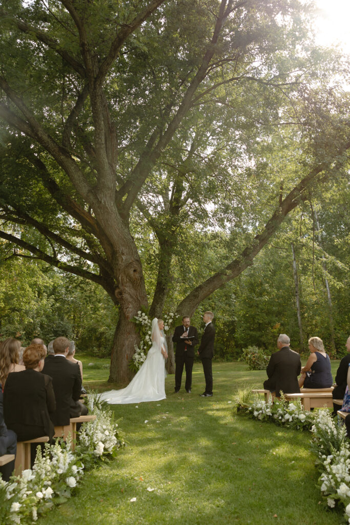 A married couple celebrating their luxurious wedding Ruttger's Lake Resort