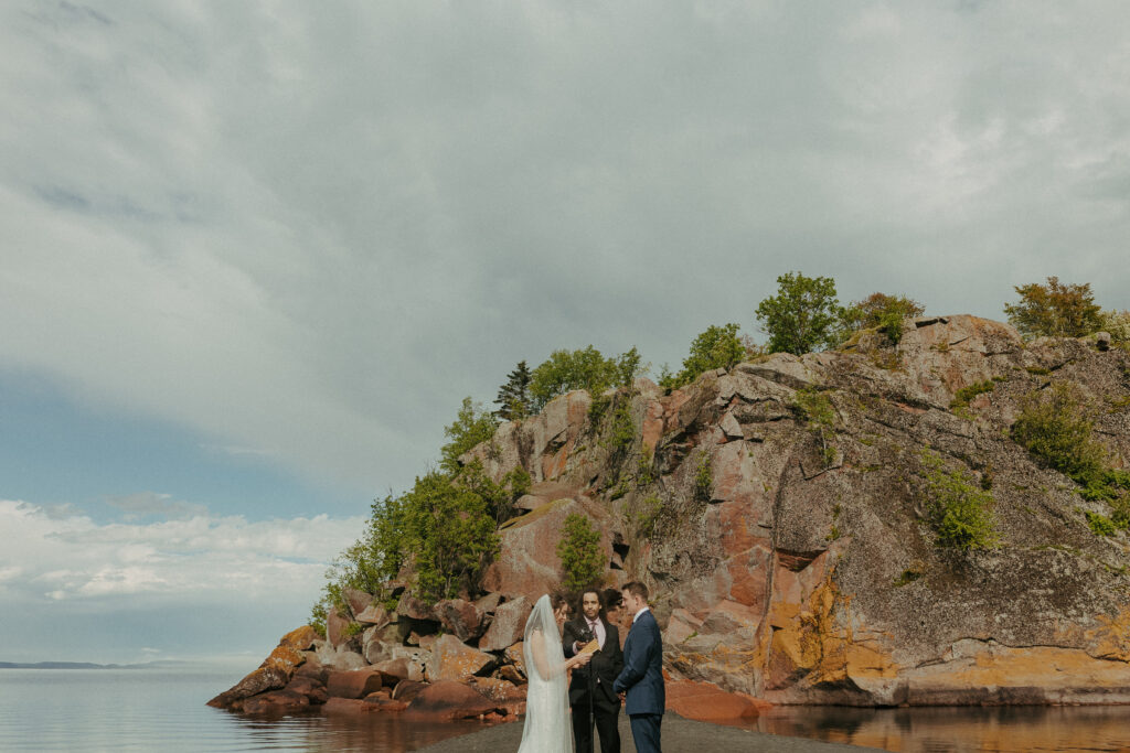 A couple eloping on Black Beach along the North Shore of Minnesota