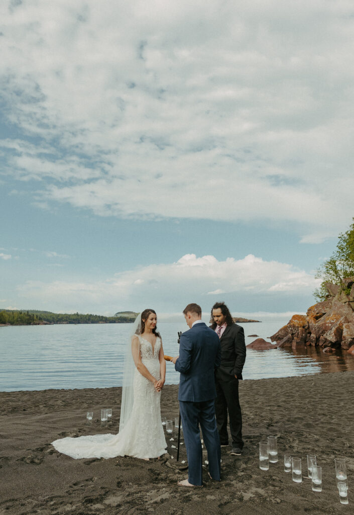 A couple eloping on Black Beach along the North Shore of Minnesota