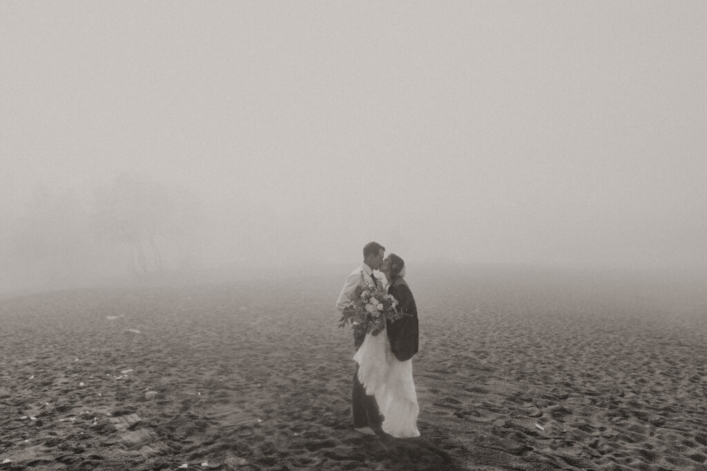 A couple eloping on Black Beach along the North Shore of Minnesota