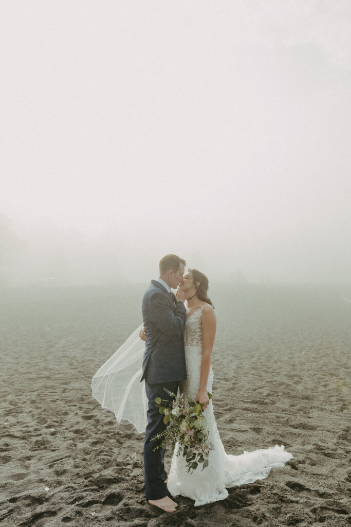 A couple eloping on Black Beach along the North Shore of Minnesota