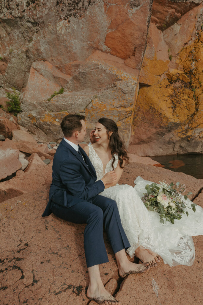 A couple eloping on Black Beach along the North Shore of Minnesota