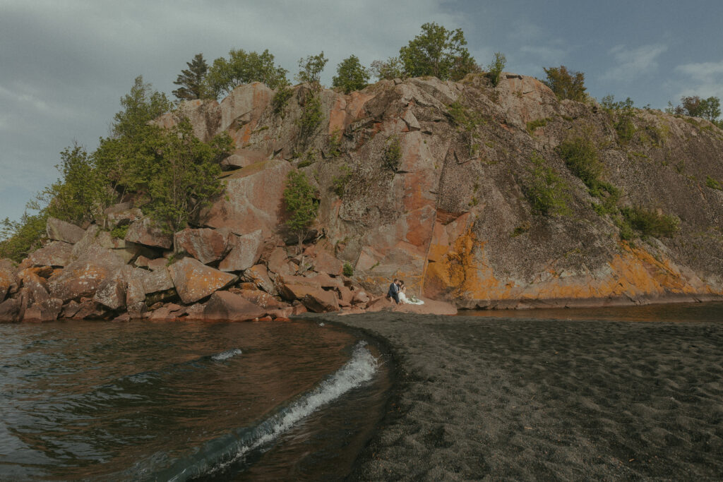 A couple eloping on Black Beach along the North Shore of Minnesota