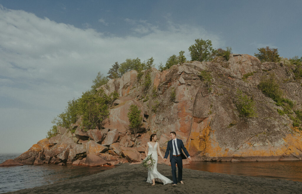 A couple eloping on Black Beach along the North Shore of Minnesota