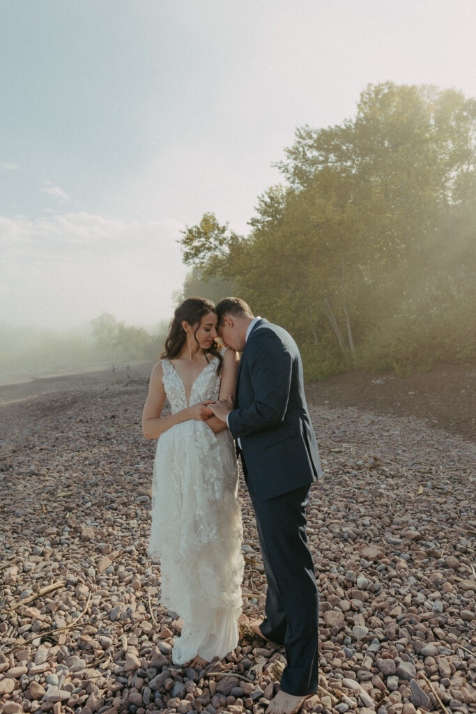 A couple eloping on Black Beach along the North Shore of Minnesota