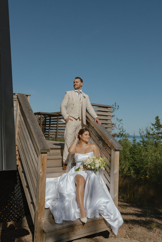 An elopement couple taking photos along the North Shore of Minnesota at an Airbnb