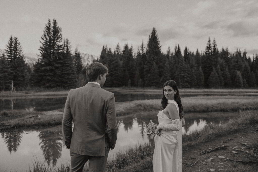 A couple eloping at sunrise at Schwabacher Landing in Grand Teton National Park