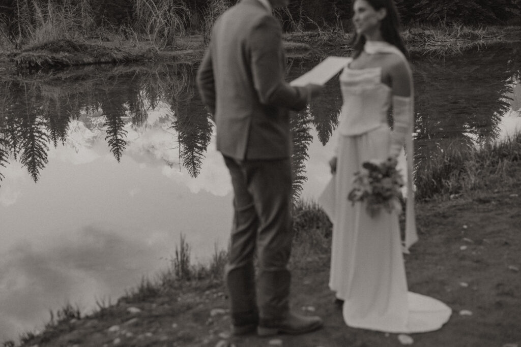 A couple eloping at sunrise at Schwabacher Landing in Grand Teton National Park