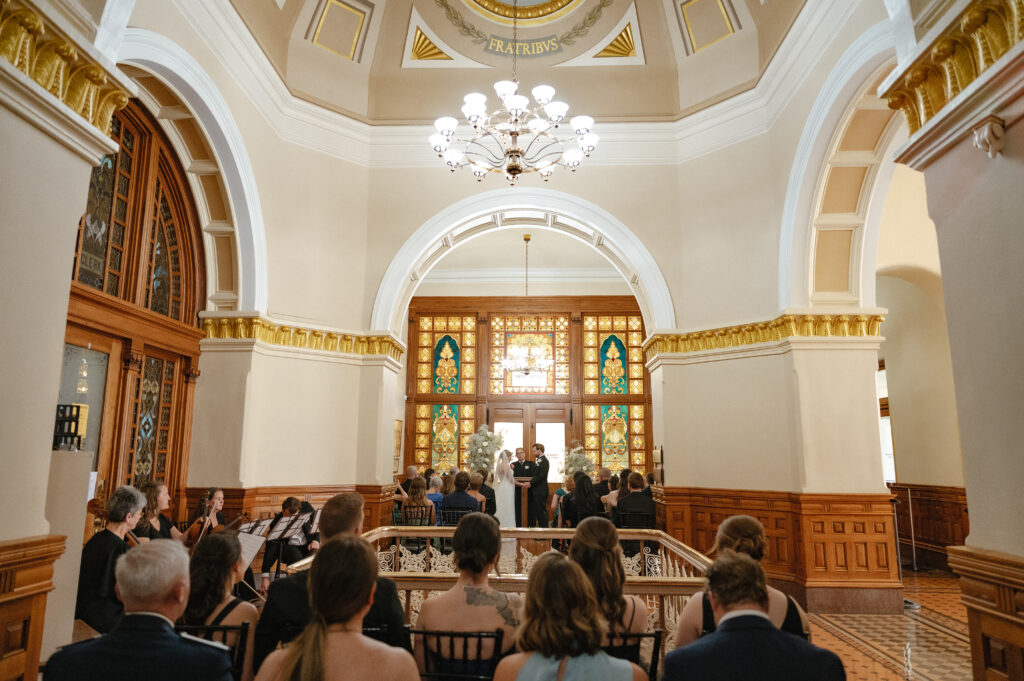 Couple exchanging vows during an intimate luxury Ohio city hall wedding in Findlay