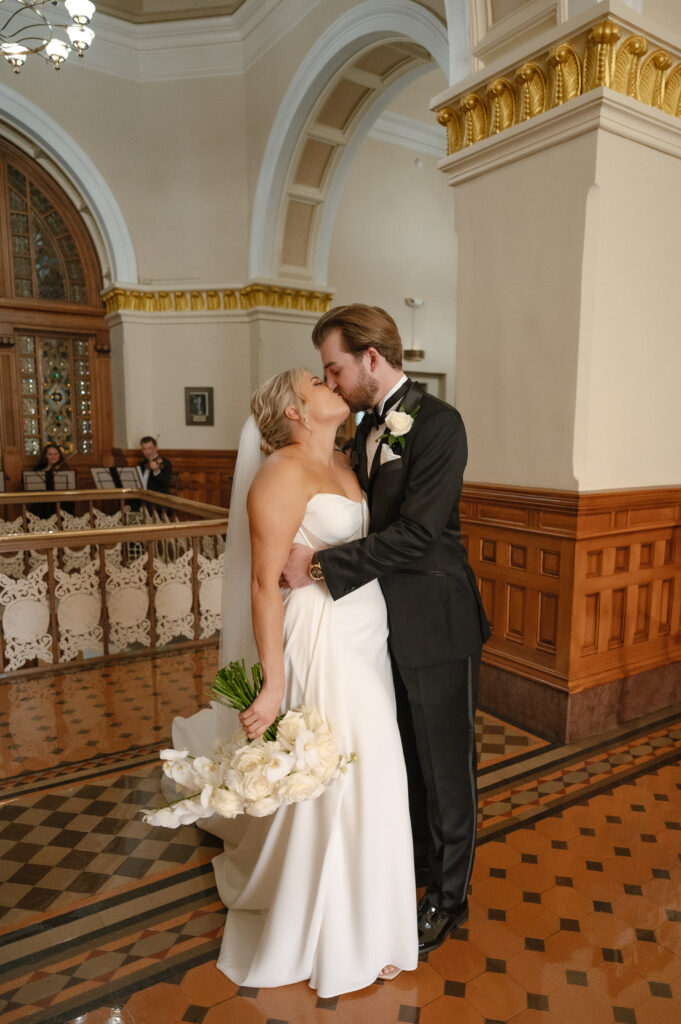 Bride and groom walking out of city hall after their Ohio courthouse wedding