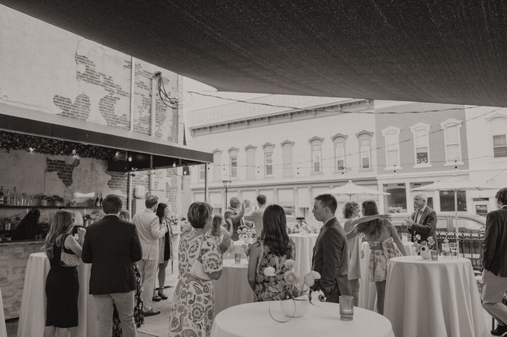 Guests celebrating together at a colorful wedding welcome party