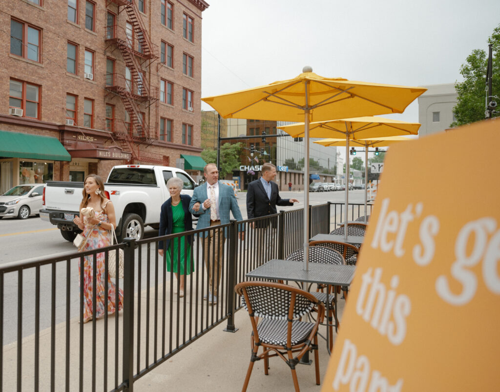 Guests celebrating together at a colorful wedding welcome party
