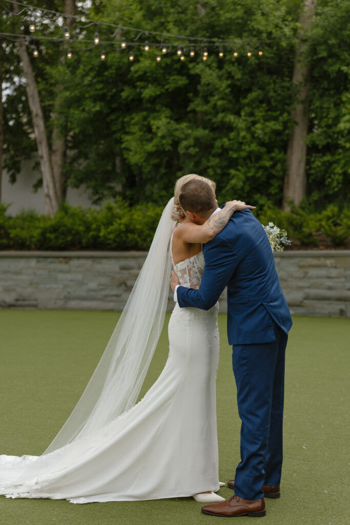 Bride and groom sharing a quiet moment during their luxury Hutton House wedding on Medicine Lake