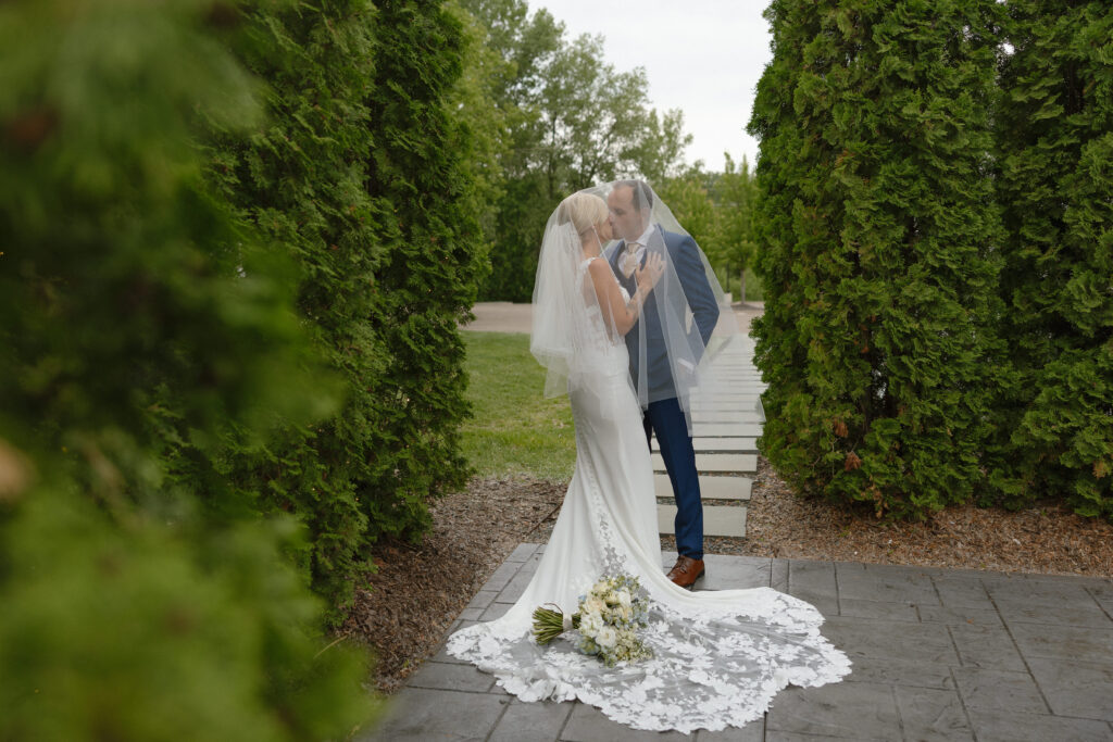 Bride and groom sharing a quiet moment during their luxury Hutton House wedding on Medicine Lake