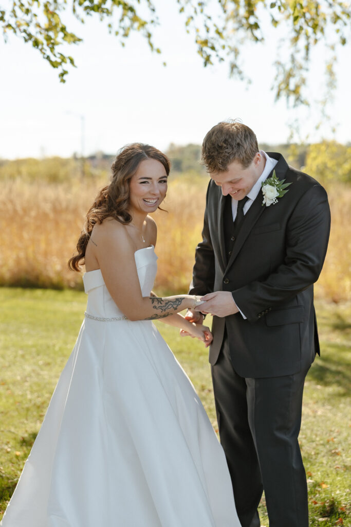 Emotional first look at Oak Glen Golf Course wedding in Stillwater MN