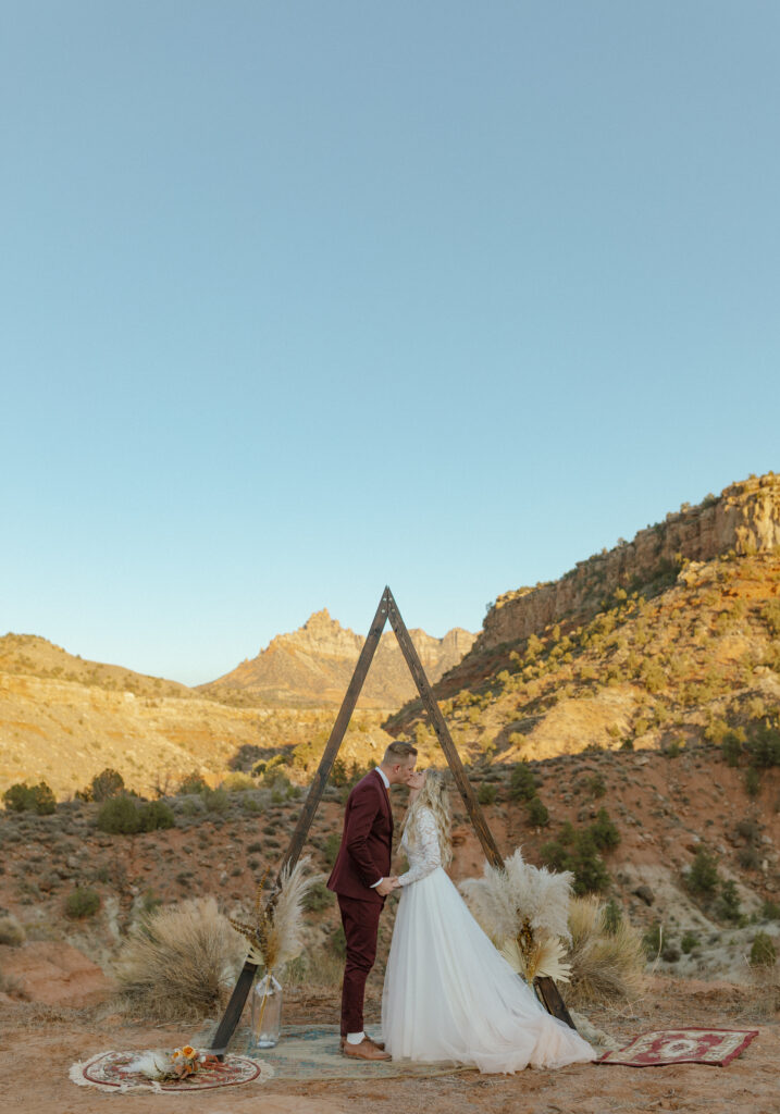 Intimate portraits of bride and groom in Zion National Park during their desert elopement