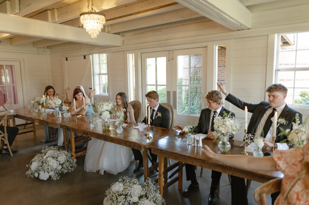 Married couple celebrating their romantic summer wedding at Redeemed Farm