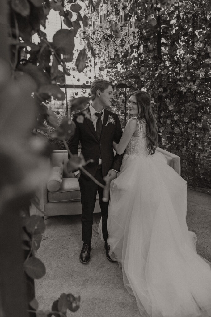 Married couple celebrating their romantic summer wedding at Redeemed Farm