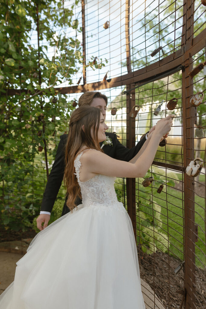 Married couple celebrating their romantic summer wedding at Redeemed Farm