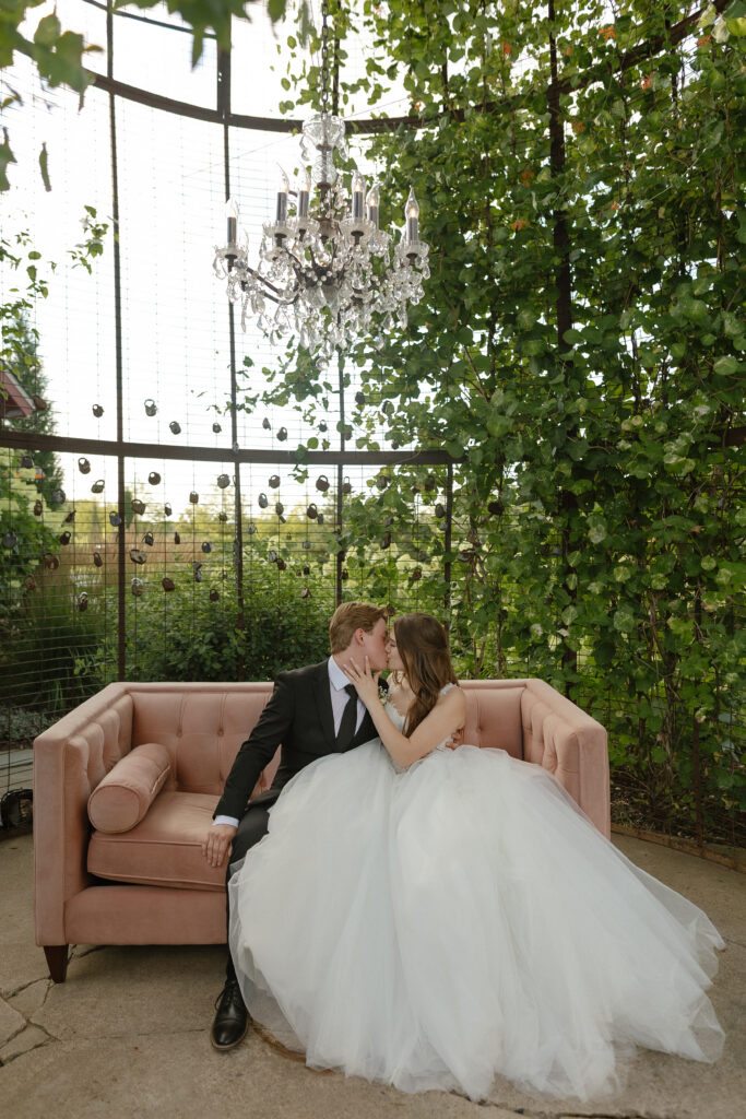Married couple celebrating their romantic summer wedding at Redeemed Farm